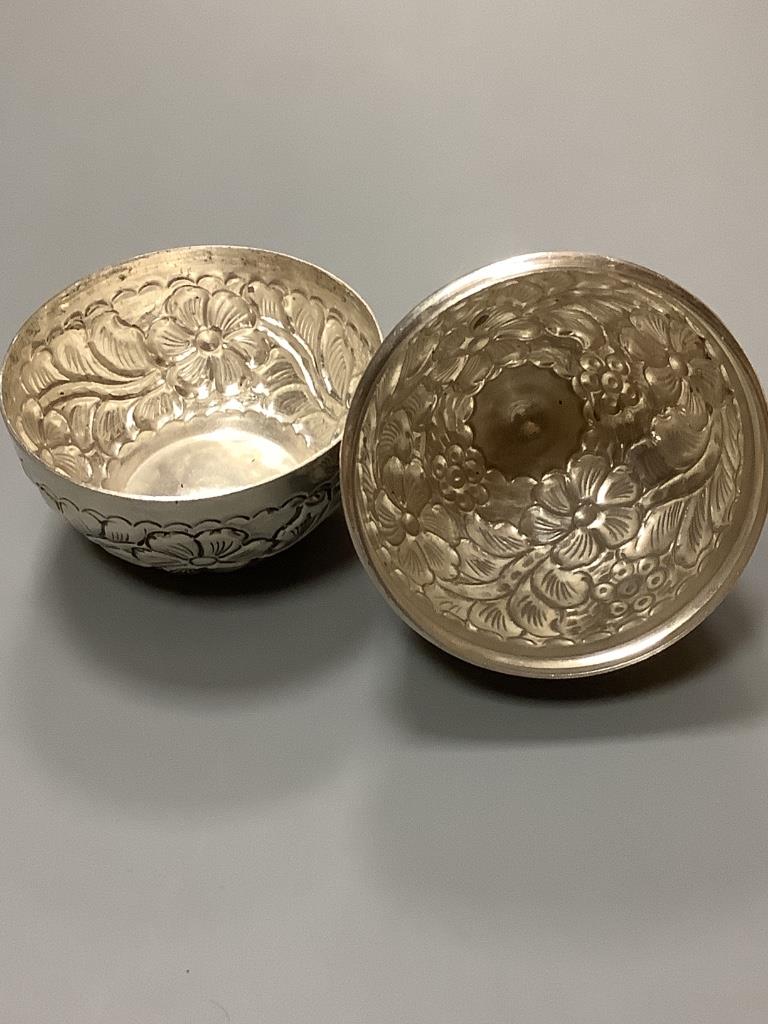 A 20th century Egyptian white metal embossed box and cover, modelled as an egg, post 1946 mark, height 10.7cm, 139 grams.